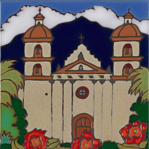 Ceramic tile with original art image of Mission Santa Barbara hand painted & kiln fired creating vivid, jewel-like colors. American made, hand crafted tile has a hardboard backing making it suitable as a trivet, original wall art or without the backing,  combine several to form a tile mosaic back splash.
