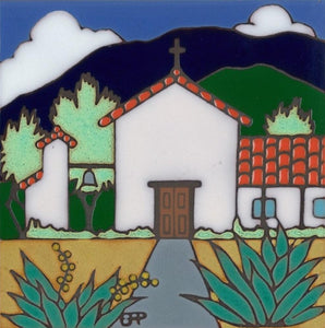 Ceramic tile with original art image of Mission Soledad hand painted then kiln "fired" creating vivid, jewel-like colors. American made, hand crafted tile has a hardboard backing making it suitable as a trivet, original wall art or without the backing, several can be combined to form a tile mosaic back splash.