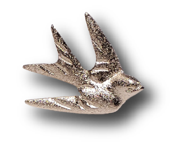 A brass Mission San Juan Capistrano Swallow in silver brass with a magnet. 2.5