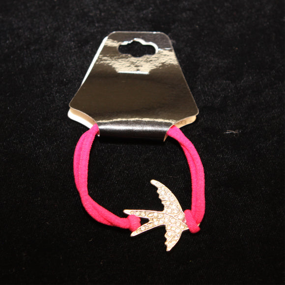 Swallow Bling Bracelet with pink elastic band.