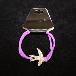 Swallow Bling Bracelet with purple elastic band.